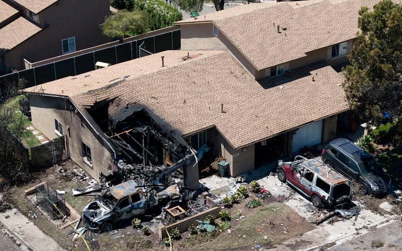 Firefighters respond to San Diego residential street engulfed in flames after plane crash
