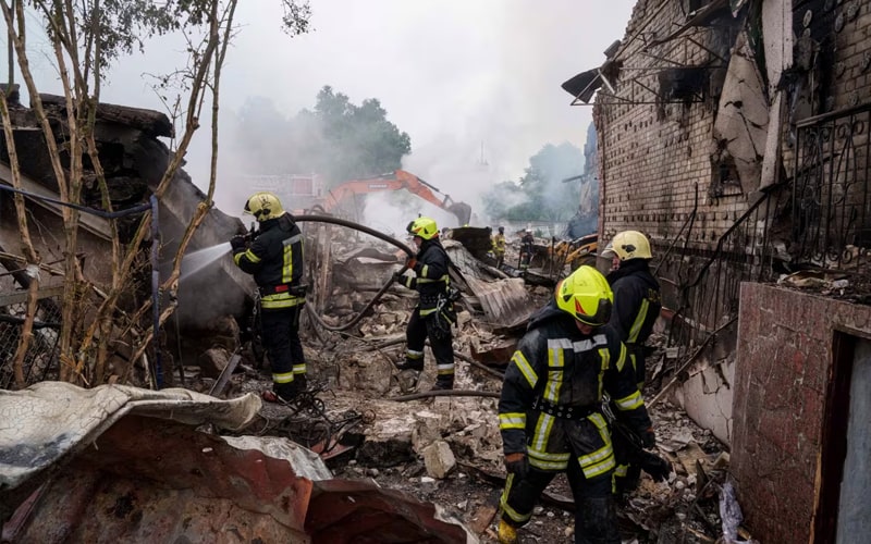 Ukraine's air defenses intercept Russian missiles over Kyiv skyline